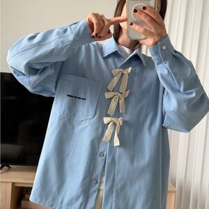 Blue Button-Up Shirt with Bow Accents